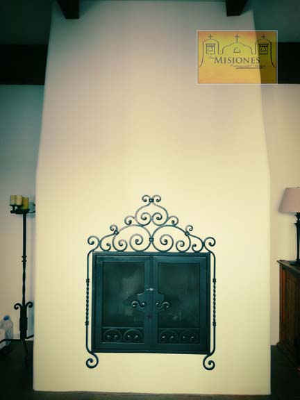 fireplace screen with solid doors and decorative scrolls above the doors, black finish